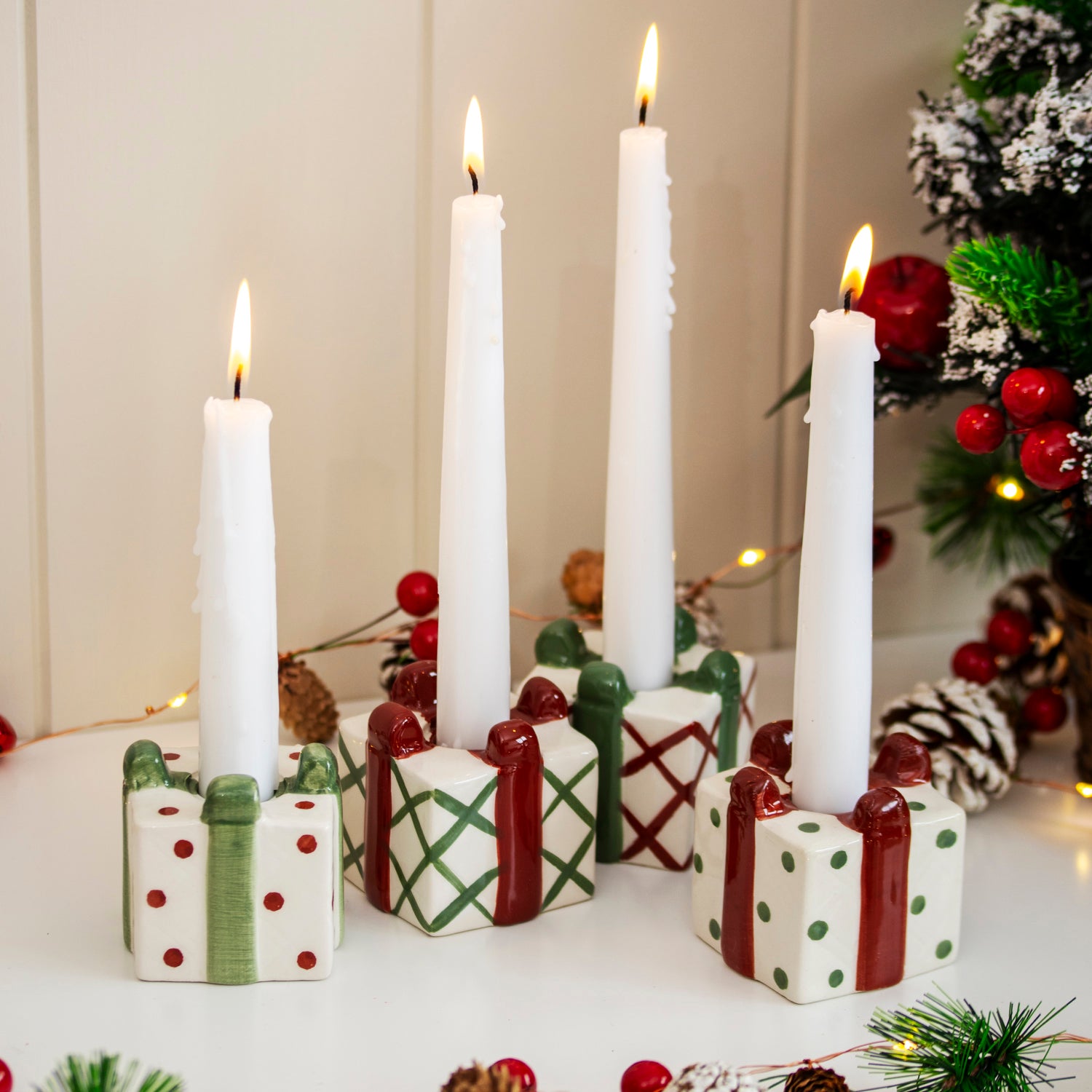 Set Of 4 Christmas Present Candlestick Holders