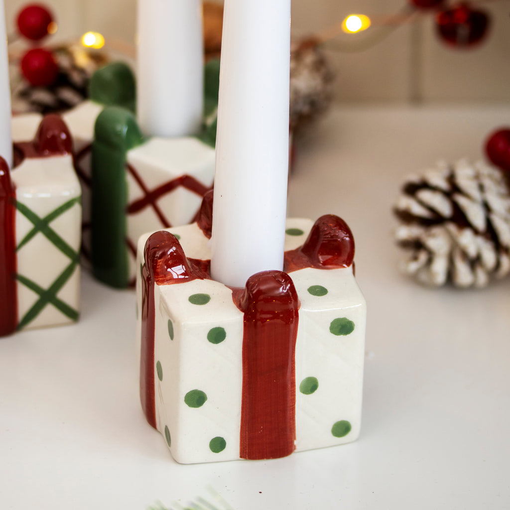 Set Of 4 Christmas Present Candlestick Holders
