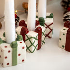 Set Of 4 Christmas Present Candlestick Holders