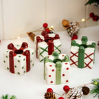 Set Of 4 Christmas Present Candlestick Holders