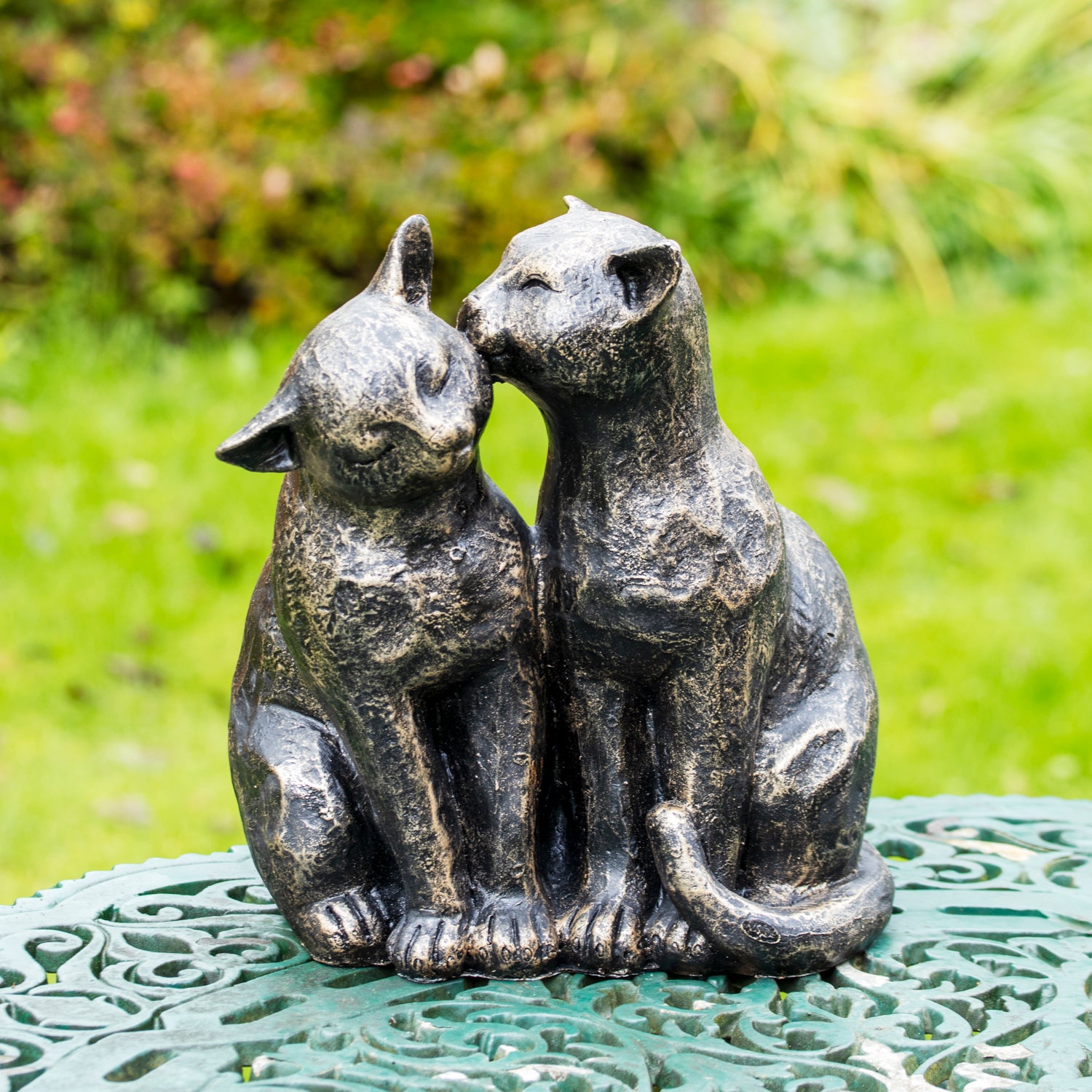 Schwarze Putzkatzen-Gartendekoration