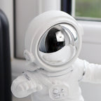 Skateboarding Astronaut Figure