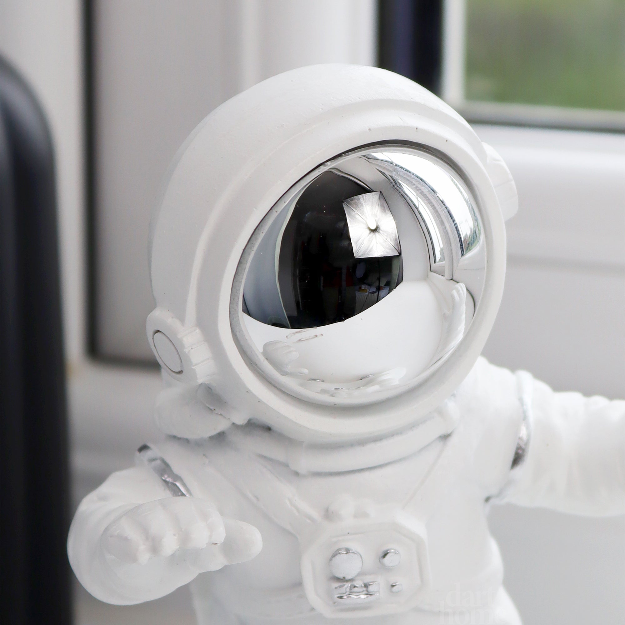 Skateboarding Astronaut Figure