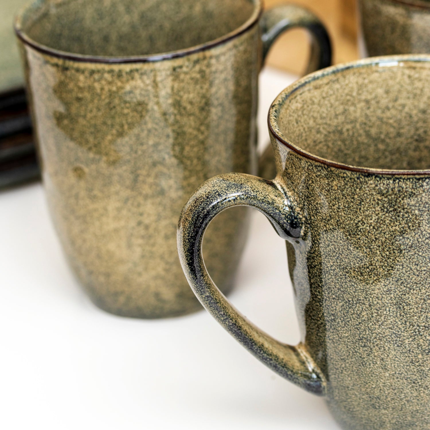 Set Of 4 Green Reactive Glaze Mugs