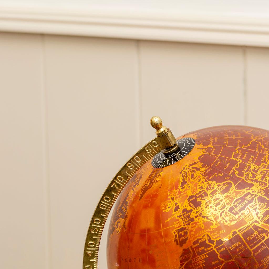 Terracotta And Gold Globe On Metal Stand