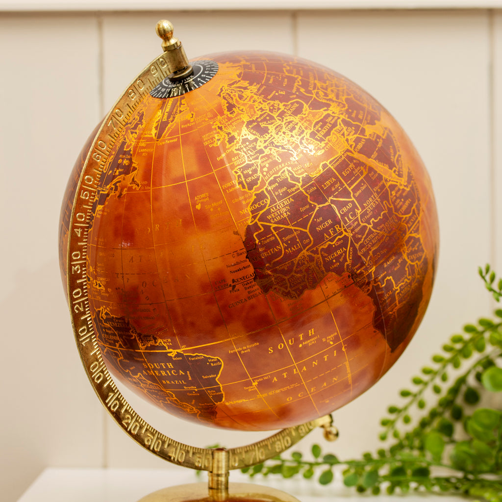 Terracotta And Gold Globe On Metal Stand