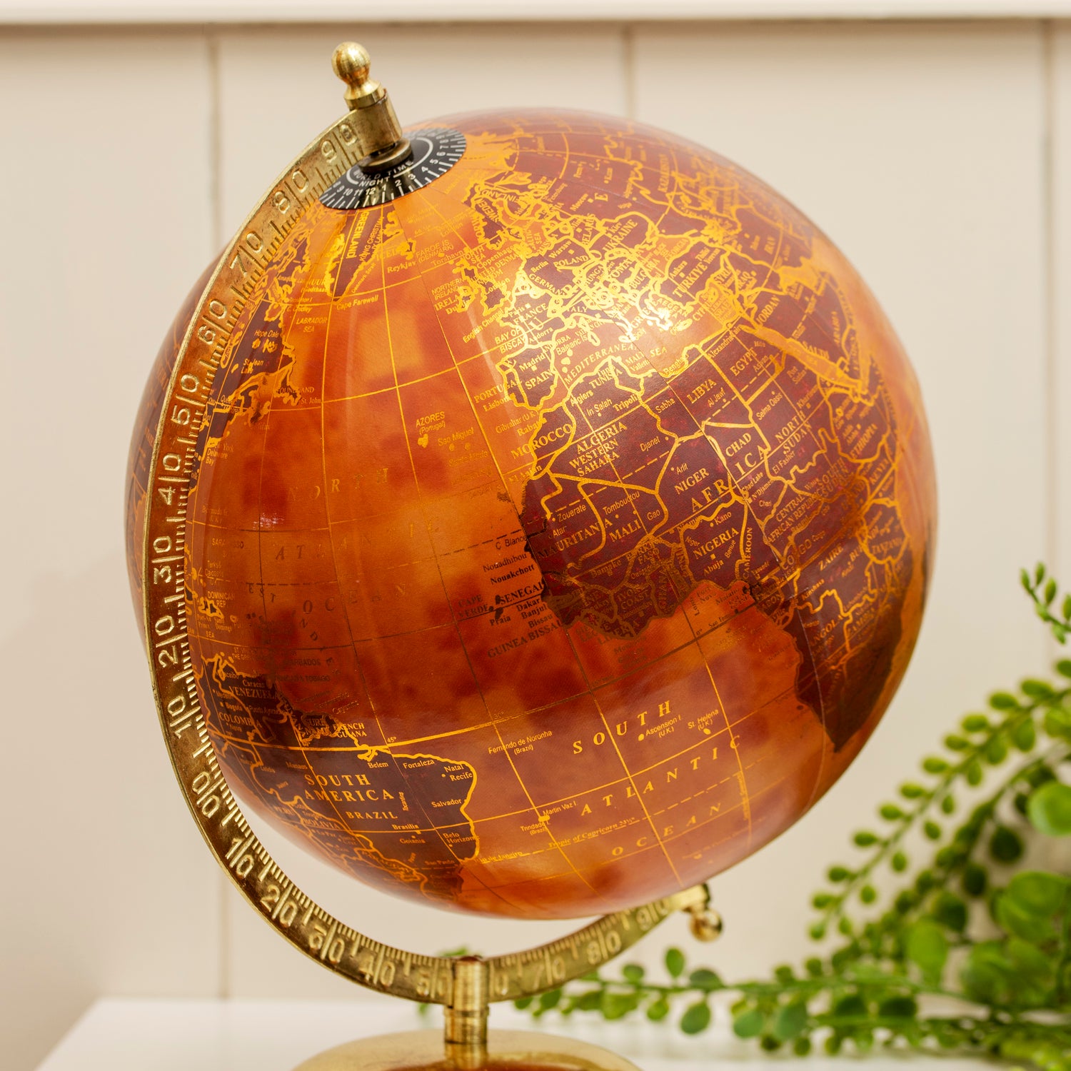 Terracotta And Gold Globe On Metal Stand
