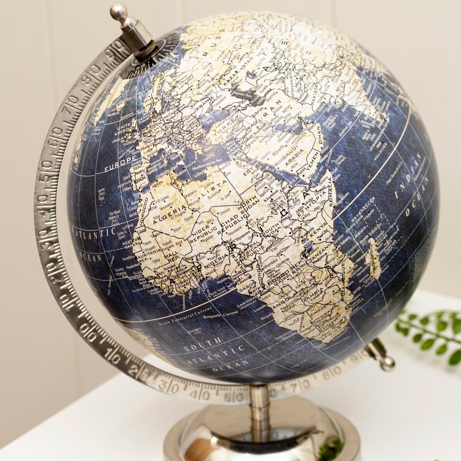 Blue And Silver Globe On Metal Stand
