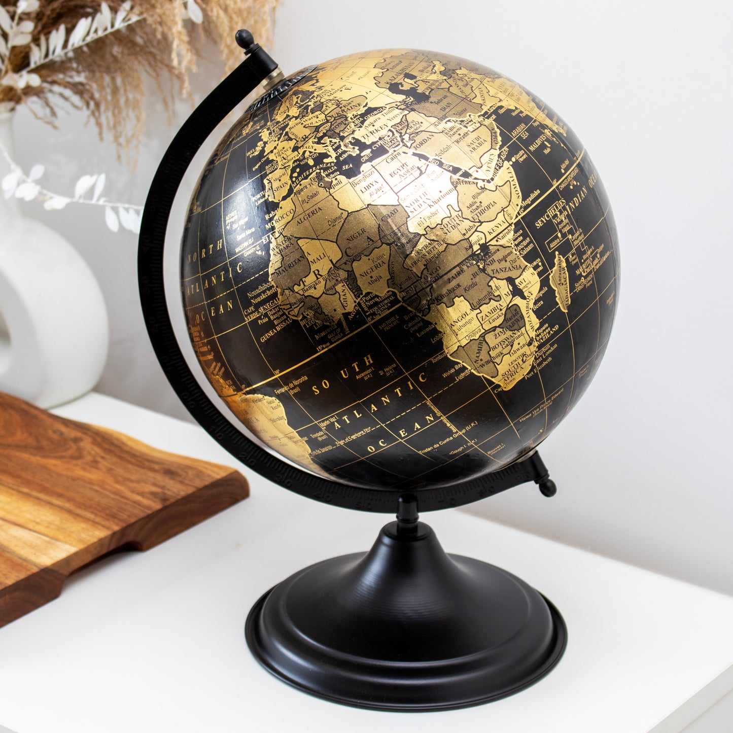 Globe Ornament On Black Metal Base