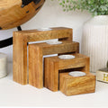 Set Of 4 Nesting Mango Wood Tea Light Holders With Candles