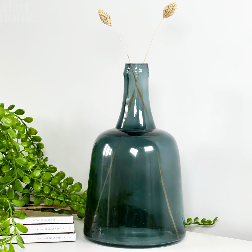 Azurblaue Glasflaschenvase