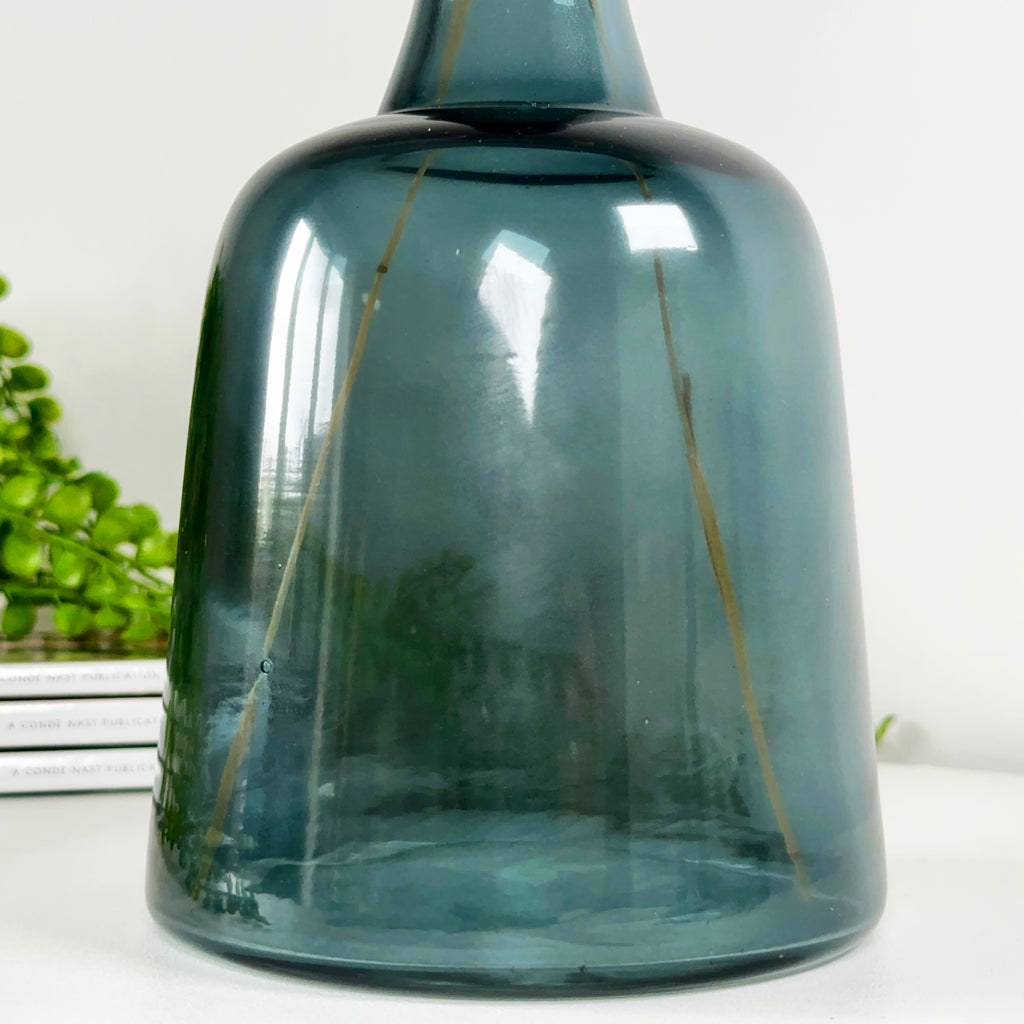 Azurblaue Glasflaschenvase