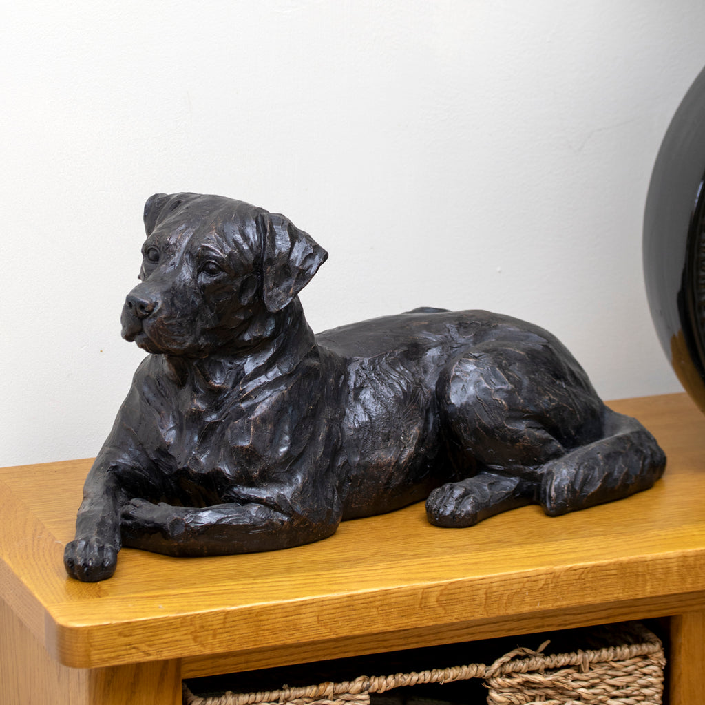 Black Laying Dog Sculpture