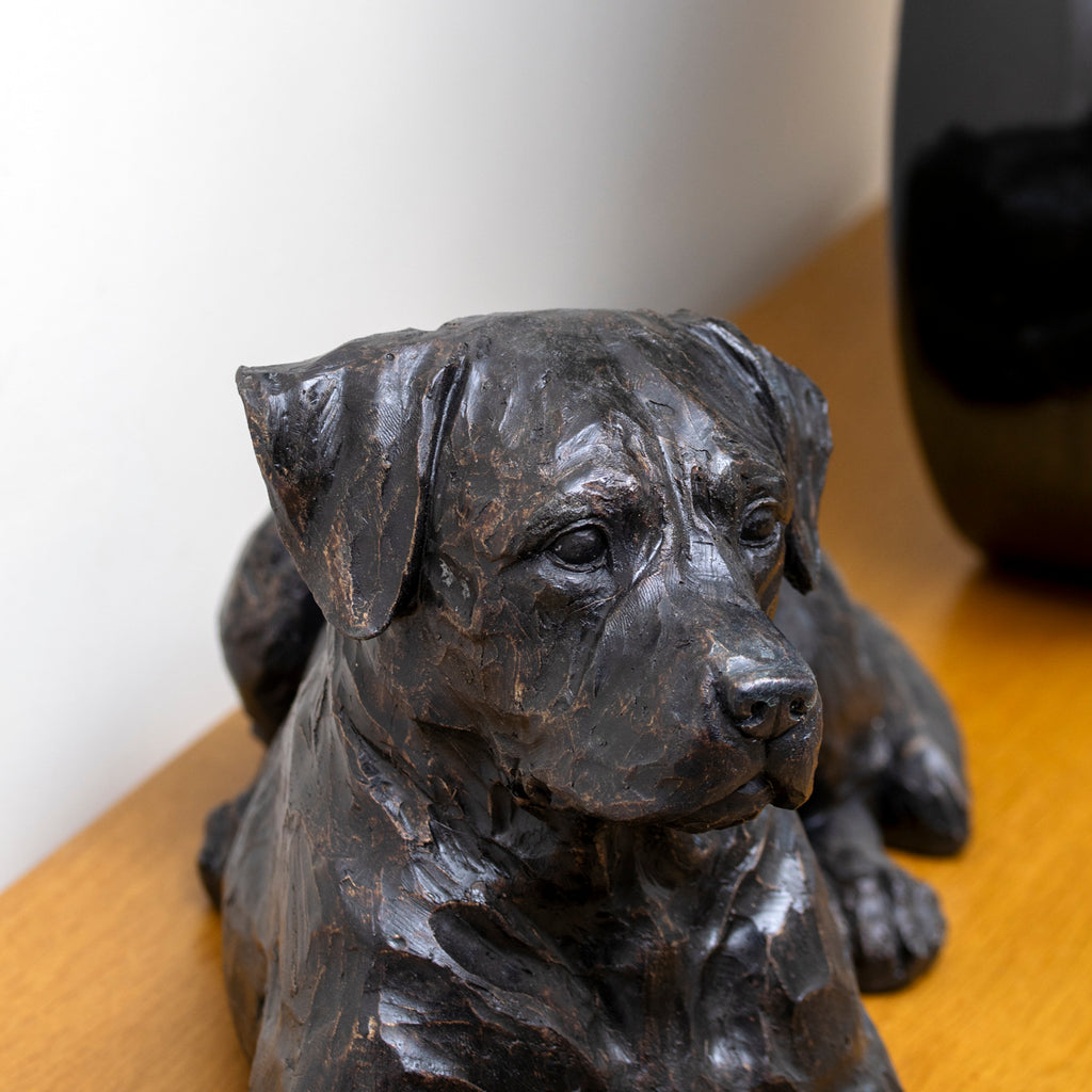 Black Laying Dog Sculpture