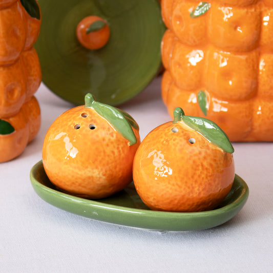 Orange Salt And Pepper Shakers With Tray