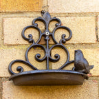 Vogeltränke aus Gusseisen mit verzierter Wand