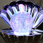 Metallic Silver Sea Shell Glitter Lamp