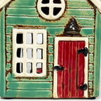 Grüner Kerzenhalter für das Ferienhaus