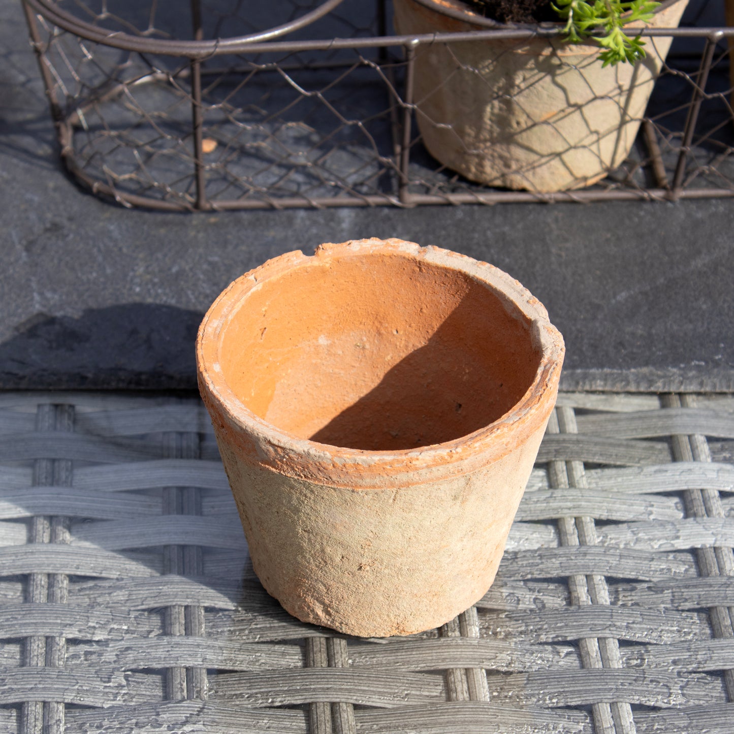 Set Of 3 Aged Terracotta Pots In Wire Basket