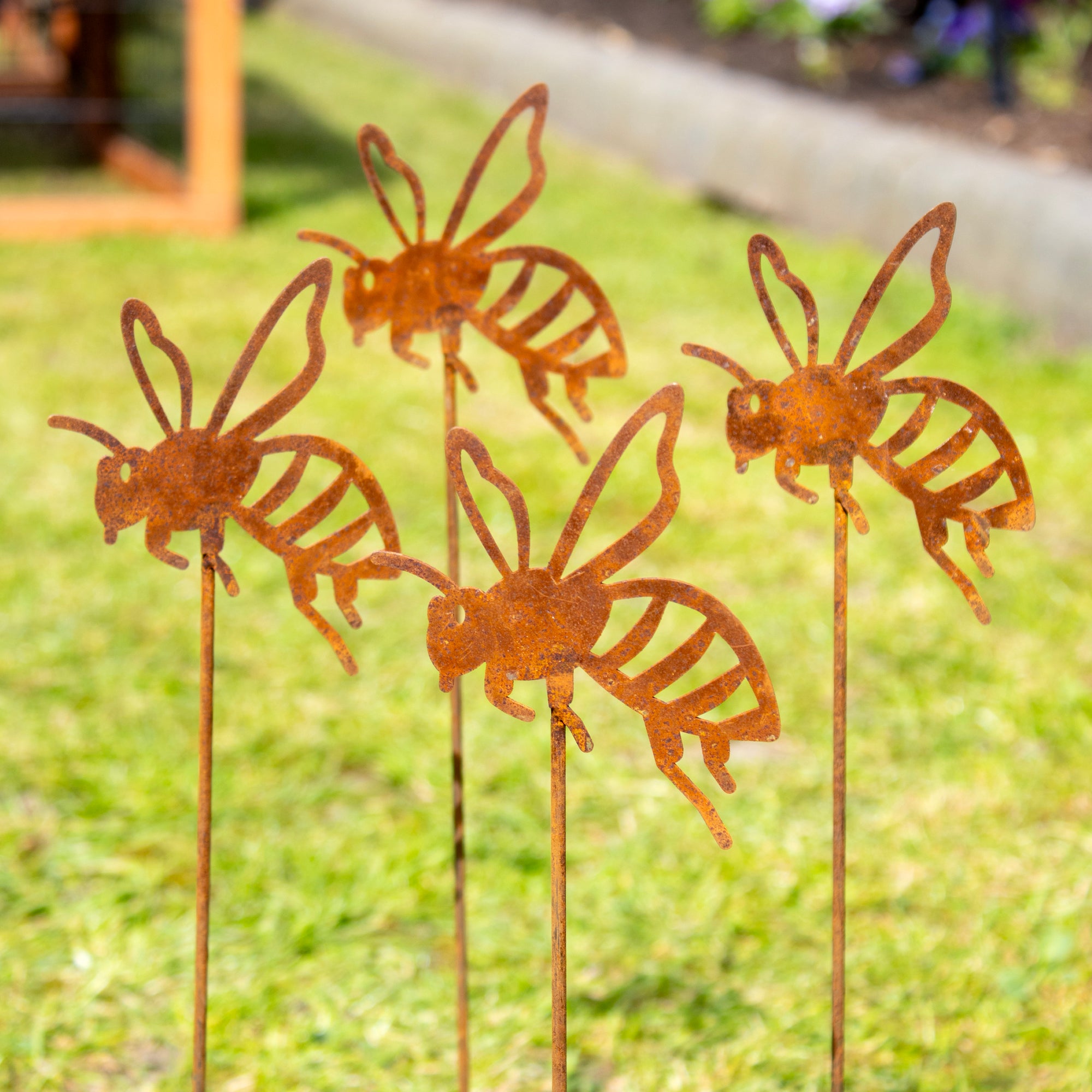 Set Of 4 Rusty Bee Garden Stakes