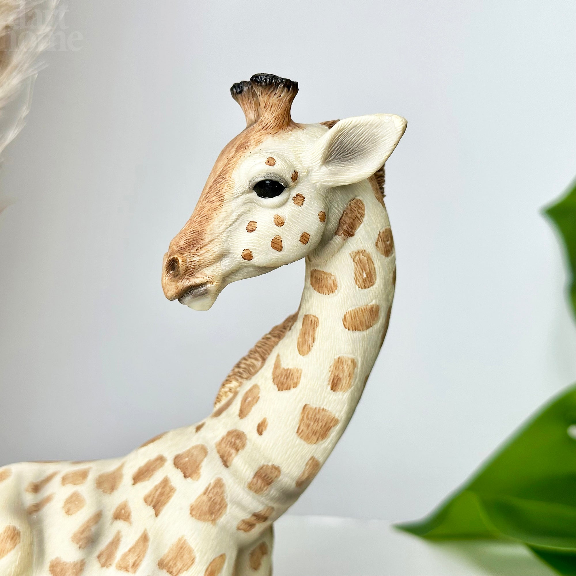 Lifelike Sitting Giraffe Ornament