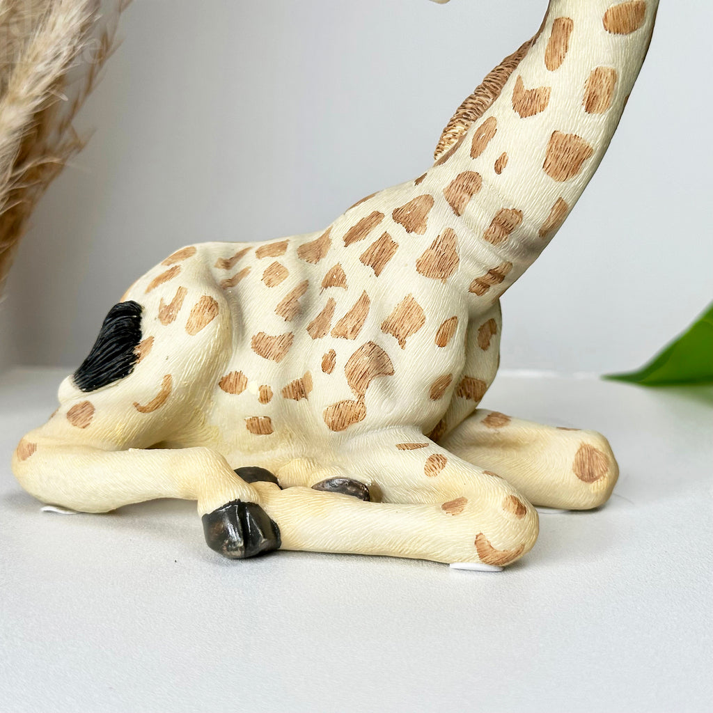 Lifelike Sitting Giraffe Ornament