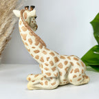 Lifelike Sitting Giraffe Ornament