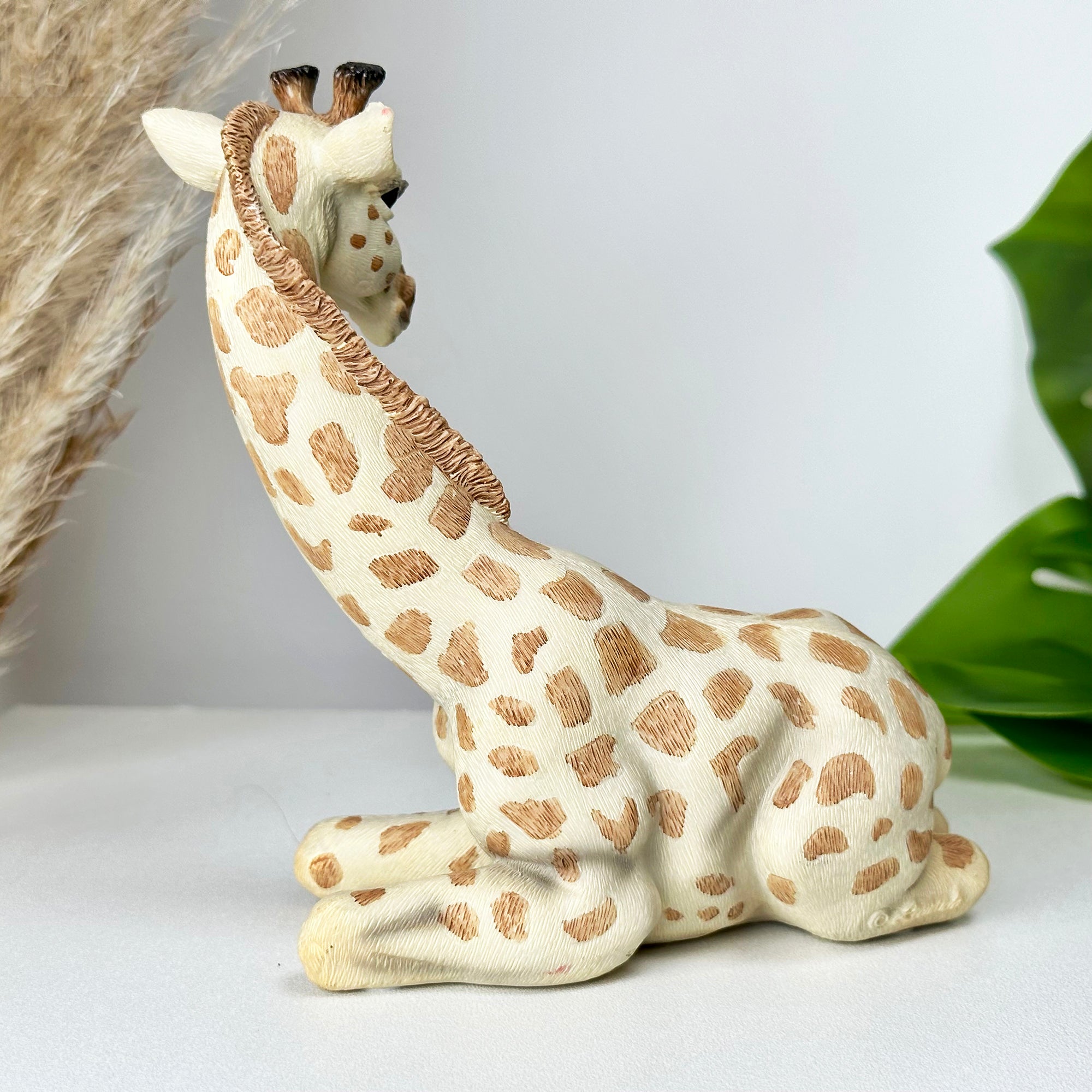 Lifelike Sitting Giraffe Ornament