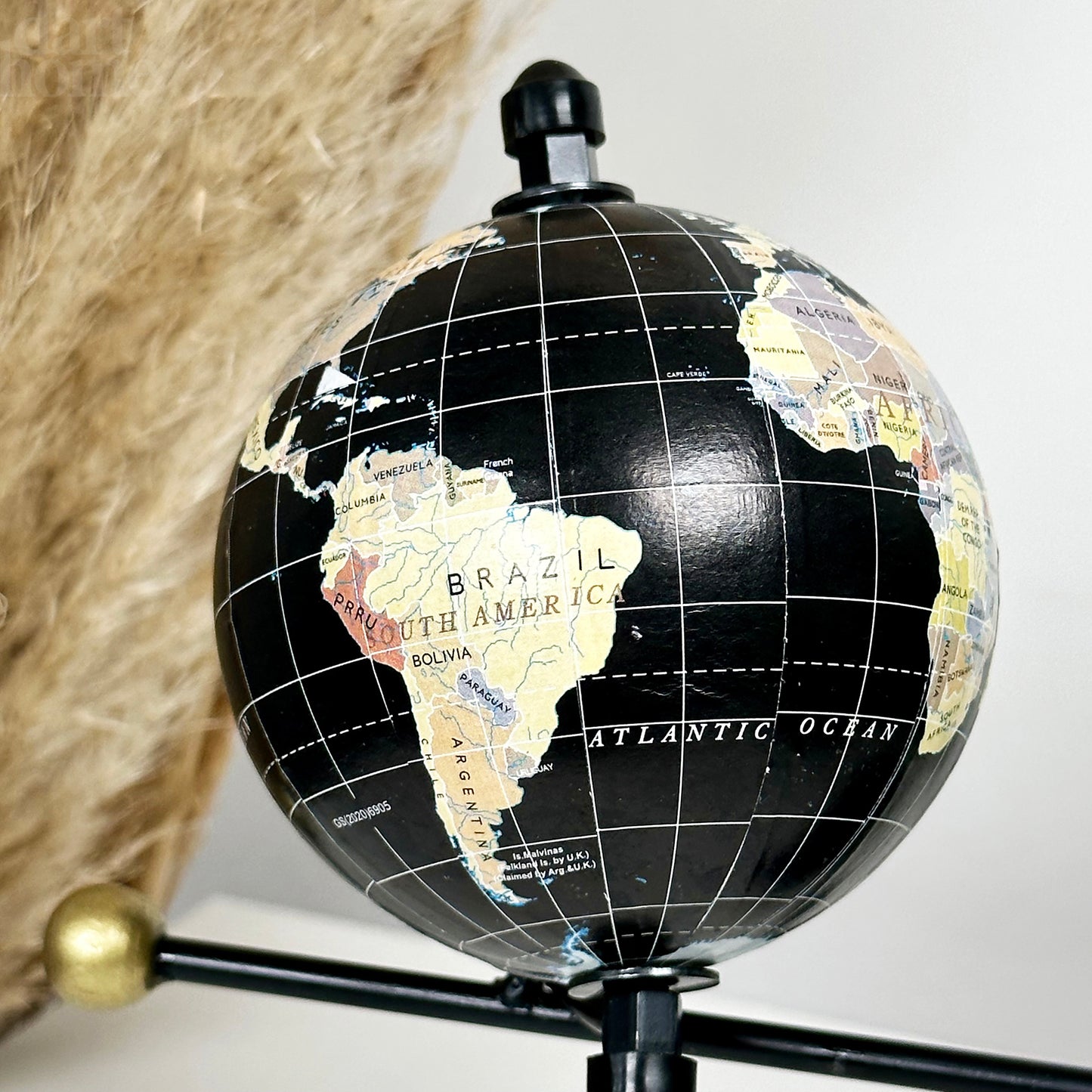 Black Globe And Man Ornament