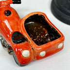 Oranger Motorrad-Beiwagen-Pflanzer