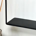 Black And Gold Clock With Shelf