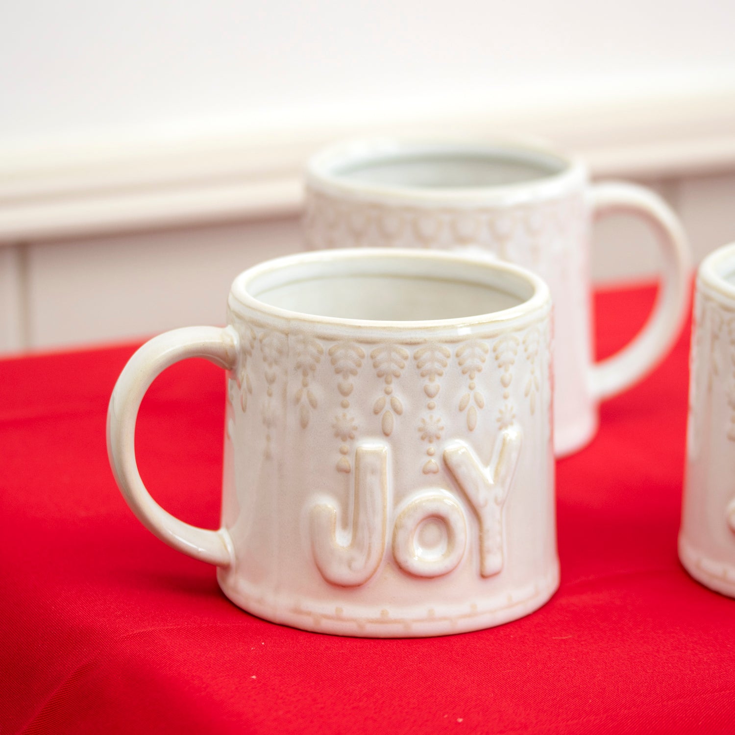 Set Of 3 Reactive Glaze Embossed Christmas Mugs