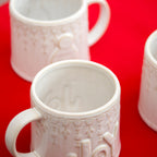 Set Of 3 Reactive Glaze Embossed Christmas Mugs