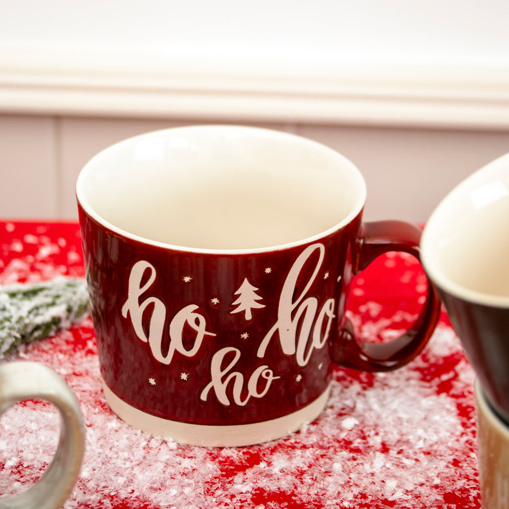 Set Of 4 Large Embossed Christmas Reactive Glaze Mugs