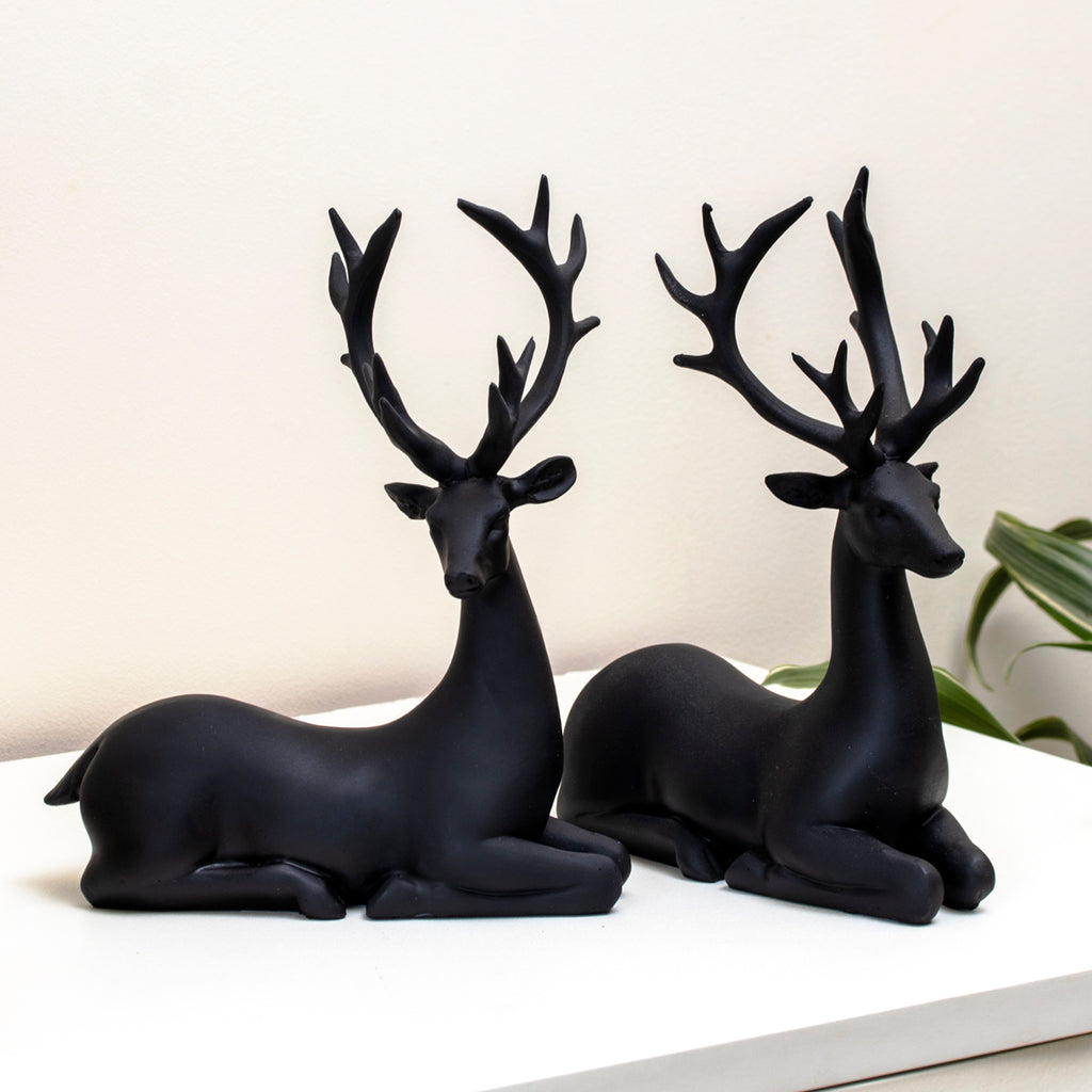 Set Of 2 Black Resin Sitting Reindeer Ornaments
