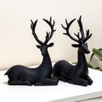 Set Of 2 Black Resin Sitting Reindeer Ornaments
