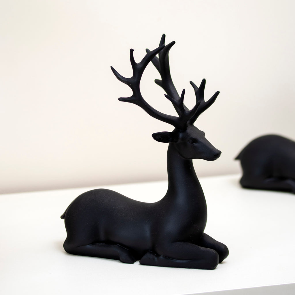 Set Of 2 Black Resin Sitting Reindeer Ornaments