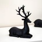 Set Of 2 Black Resin Sitting Reindeer Ornaments