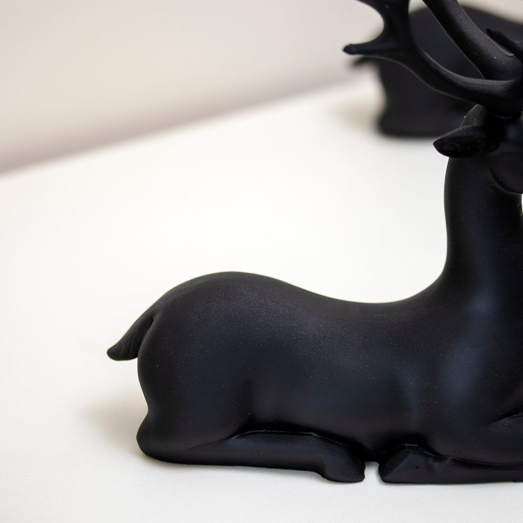 Set Of 2 Black Resin Sitting Reindeer Ornaments