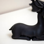 Set Of 2 Black Resin Sitting Reindeer Ornaments