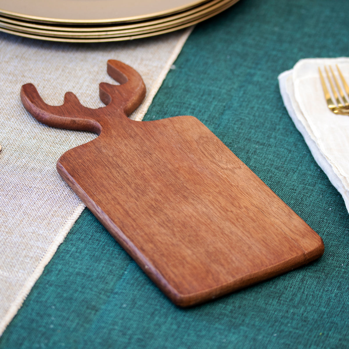 Runde geschnitzte Schneidebretter aus braunem Mangoholz
