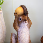 Squirrel Holding Acorn Ornament