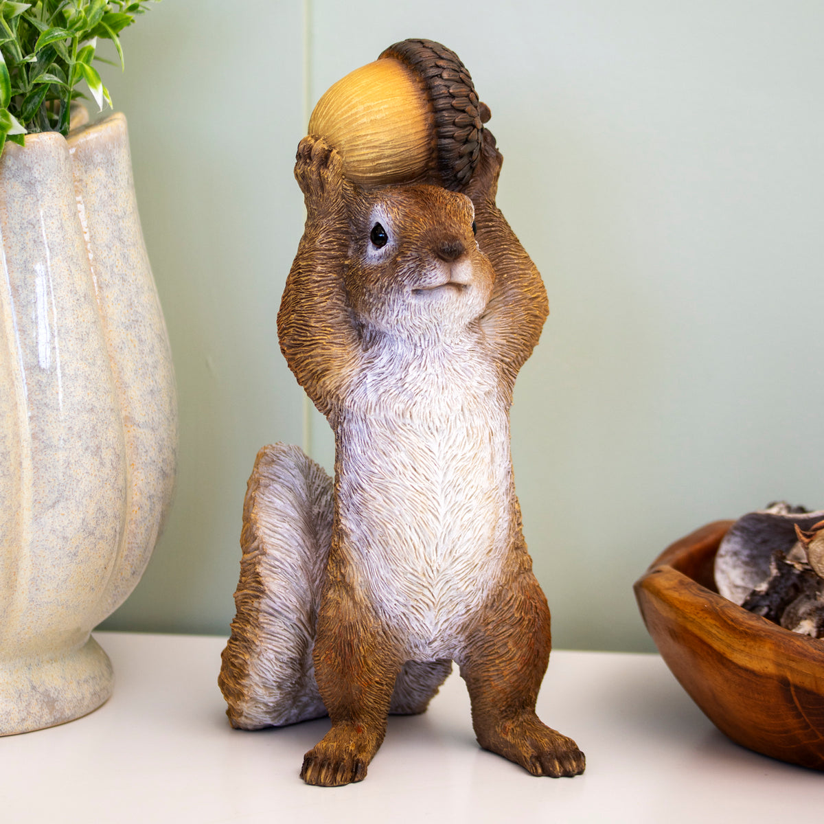 Squirrel Holding Acorn Ornament