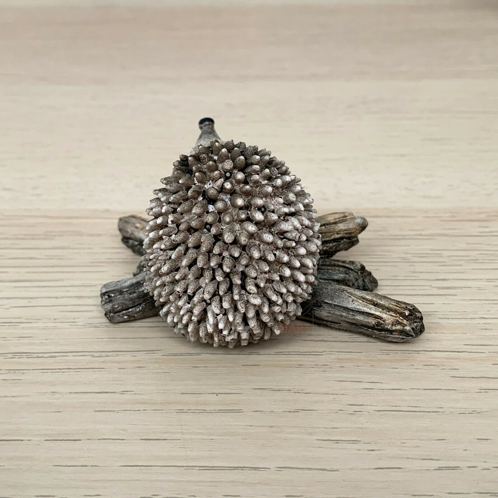 Miniature Pair Of Hedgehogs On Branch