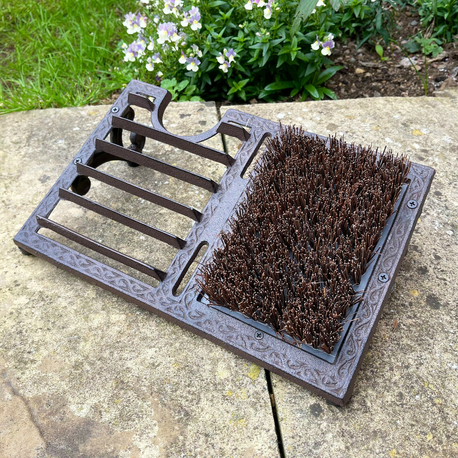 Cast iron boot jack and outlet scraper