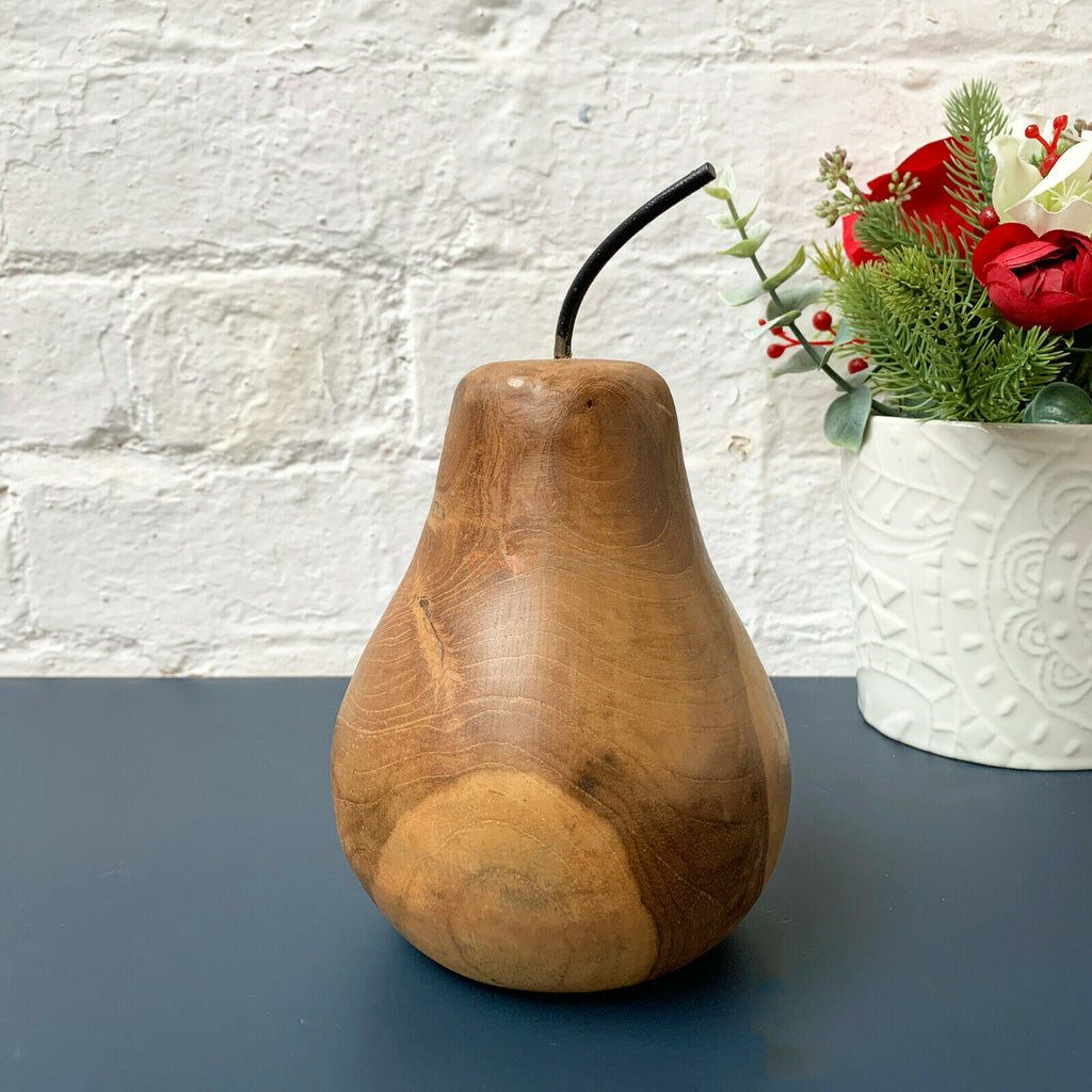 Apfel- und Birnen-Ornamente aus Teakholz