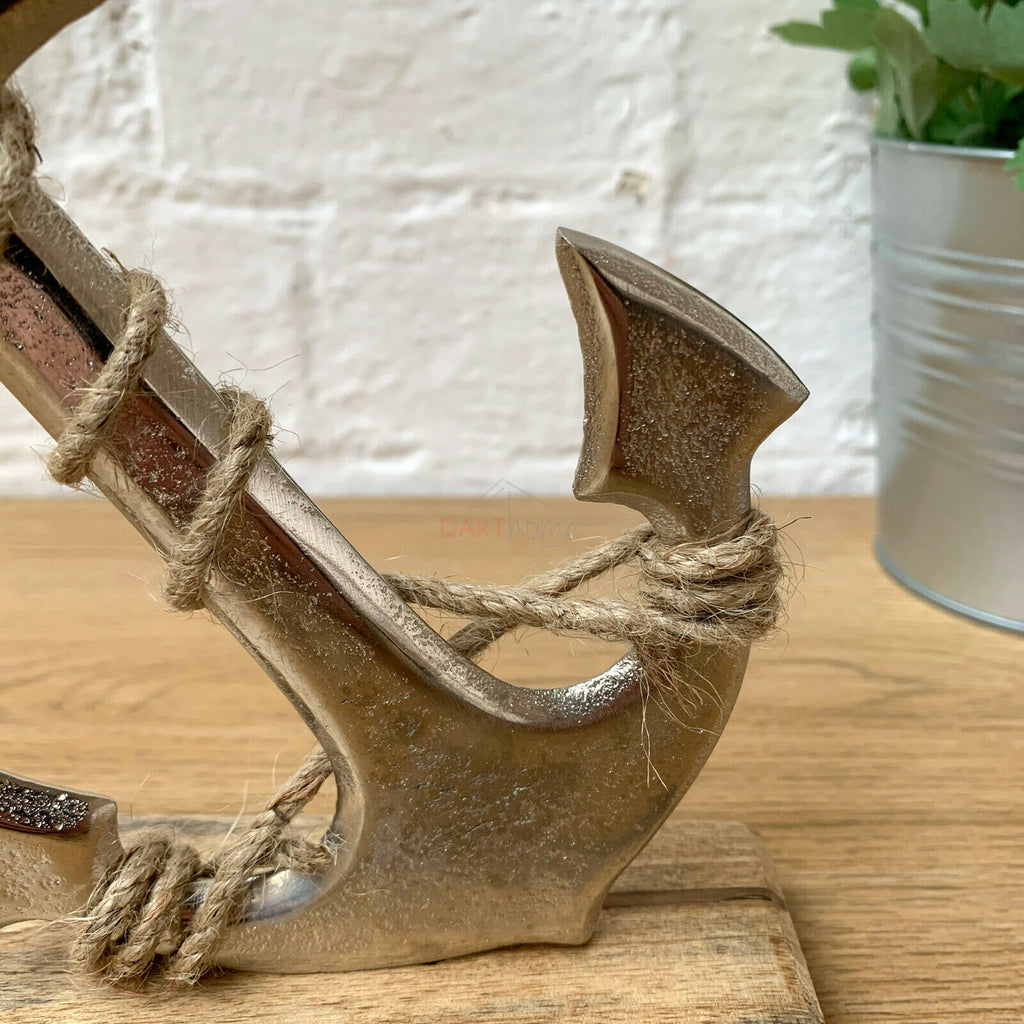 Silver Metal Anchor Ornament On Wooden Stand