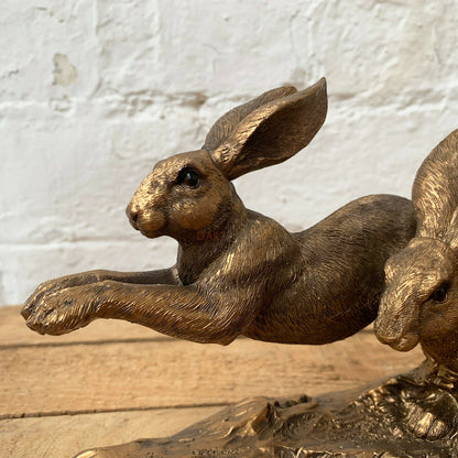 Bronze Three Jumping Hares Ornament