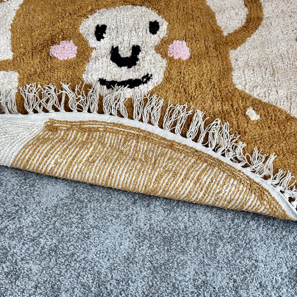 Tufted Cotton Monkey Floor Rug With Tassels