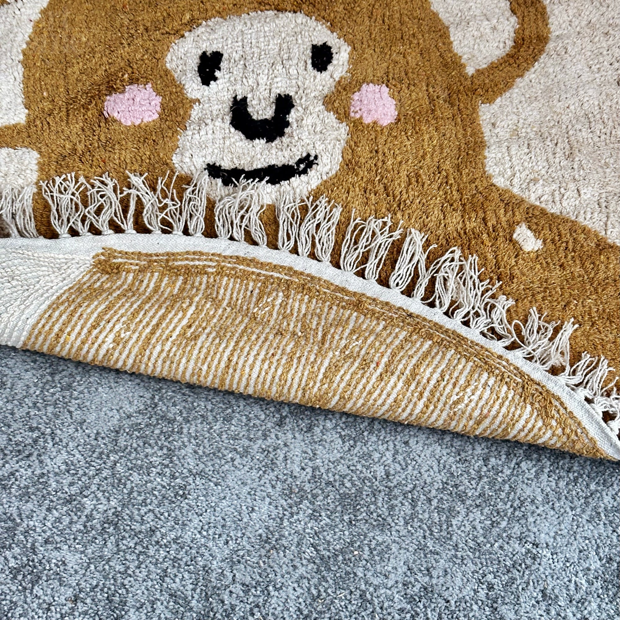 Tufted Cotton Monkey Floor Rug With Tassels